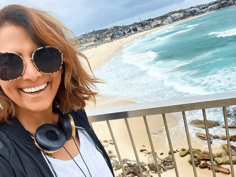 Sally Obermeder walking beside the beach for exercise