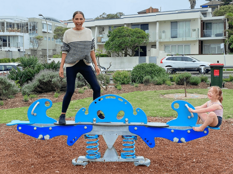 Sally Obermeder playing in the park with her daughter after 22 kilogram weight loss