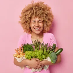 SWIISH-WOMAN-VEGGIES-SMILING