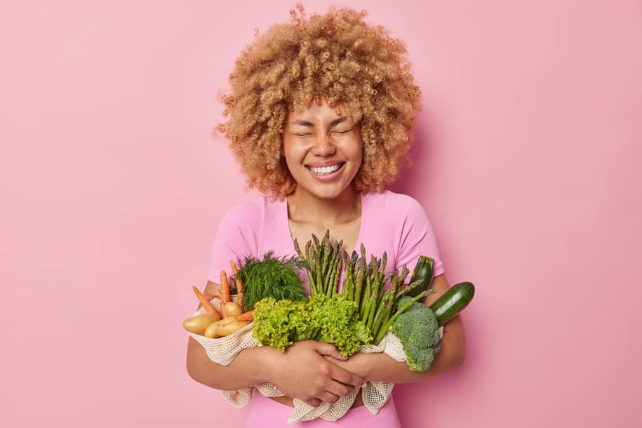 SWIISH-WOMAN-VEGGIES-SMILING