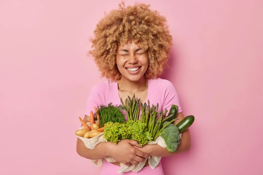 SWIISH-WOMAN-VEGGIES-SMILING