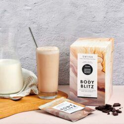 Body Blitz Protein Powder with drink and chocolate