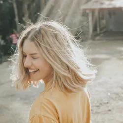Healthy Hormones girl smiling in the sunshine